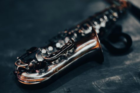 saxophone laying on ground